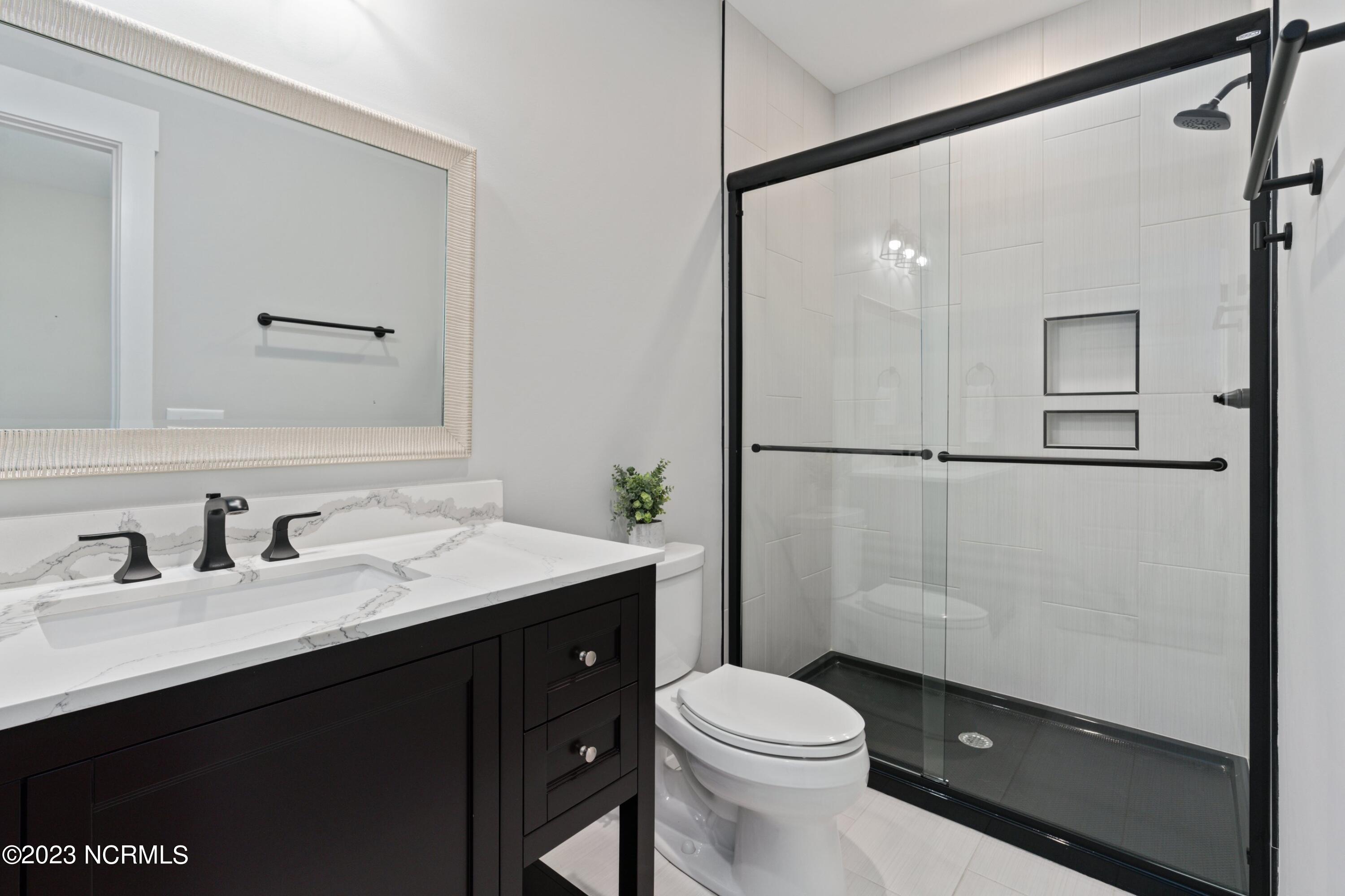 158 Brookhaven Trail Leland, NC 28451 - Photo 26 of 74 Guest room en suite bathroom.