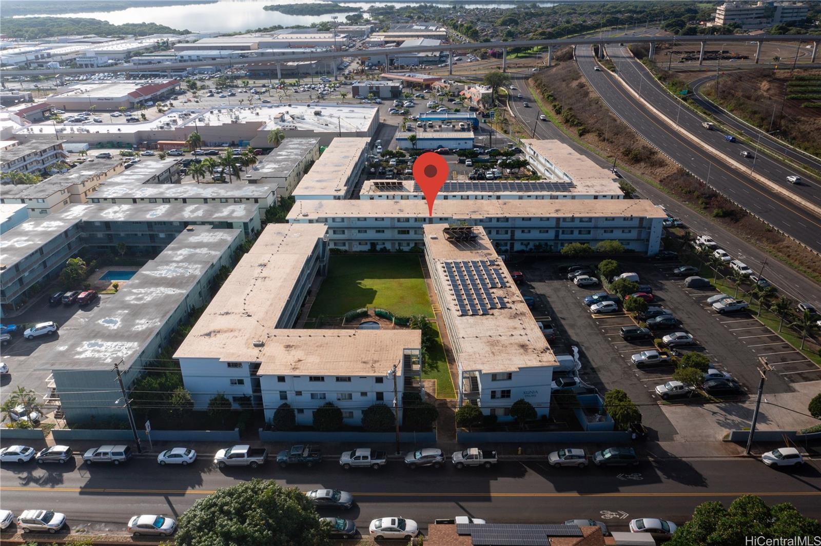 94-011 Waipahu Street, Unit D311 Waipahu, HI 96797 - Photo 15 of 16 an aerial view of multiple houses