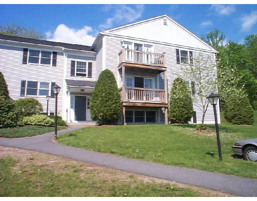 44 Evergreen Road, Unit 104A Northampton, MA 01053 - Photo 1 of 1 a front view of a house with a yard