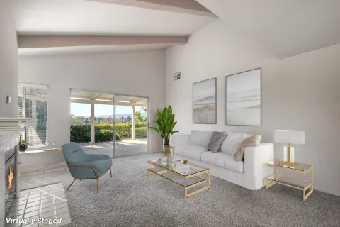 a bed room with a bed and a chair