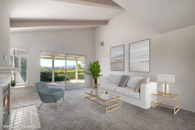 a bed room with a bed and a chair