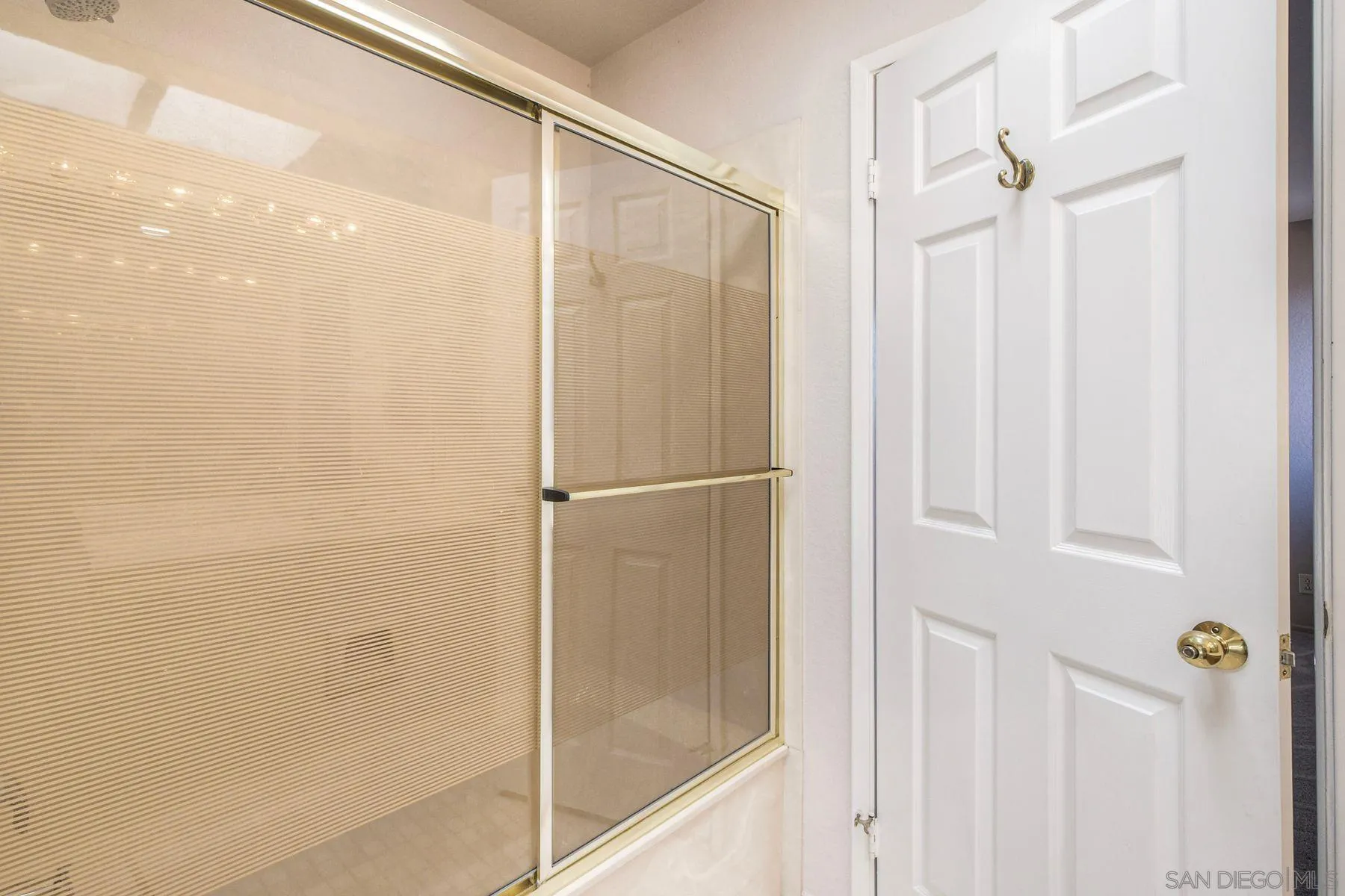 1089 Ridge Heights Drive Fallbrook, CA 92028 - Photo 21 of 42 a bathroom with a glass shower door