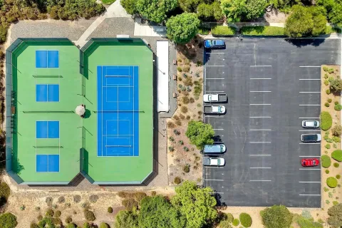 front view of a brick building with glass windows