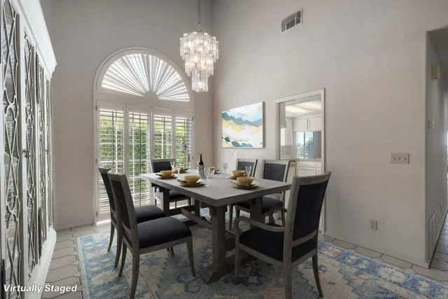 a kitchen with a stove a sink and a refrigerator