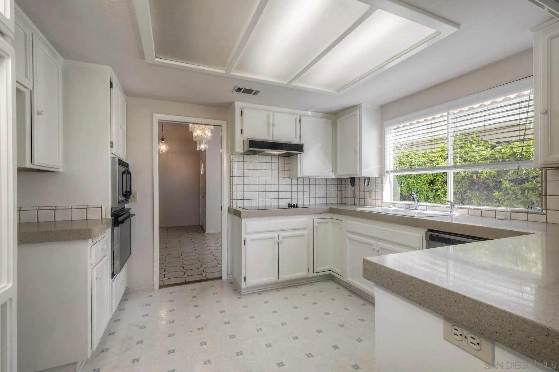 1089 Ridge Heights Drive Fallbrook, CA 92028 - Photo 8 of 42 a kitchen with a sink stove and refrigerator