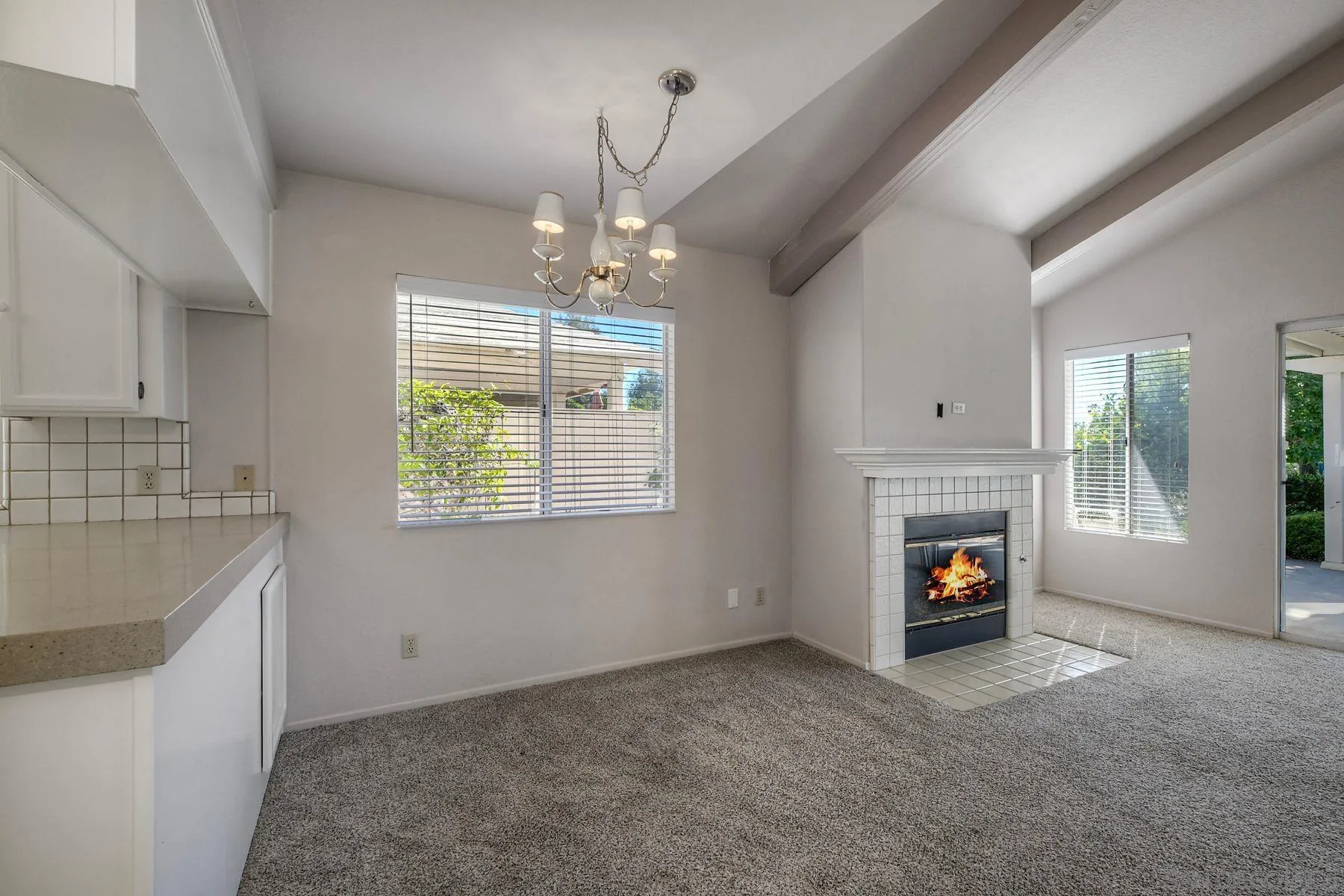 1089 Ridge Heights Drive Fallbrook, CA 92028 - Photo 10 of 42 a view of an empty room with a fireplace and window
