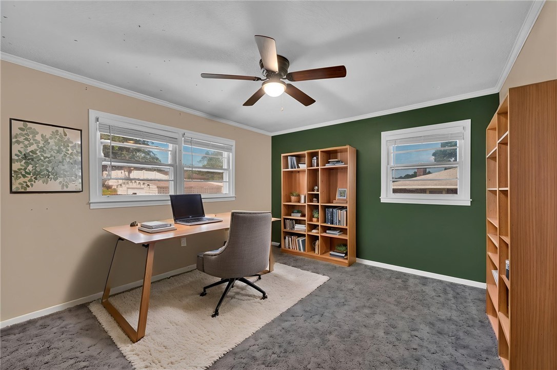 121 Wilson Road Anderson, SC 29625 - Photo 25 of 40 Crown molding and plush carpeting define this versatile home workspace with generous natural light.