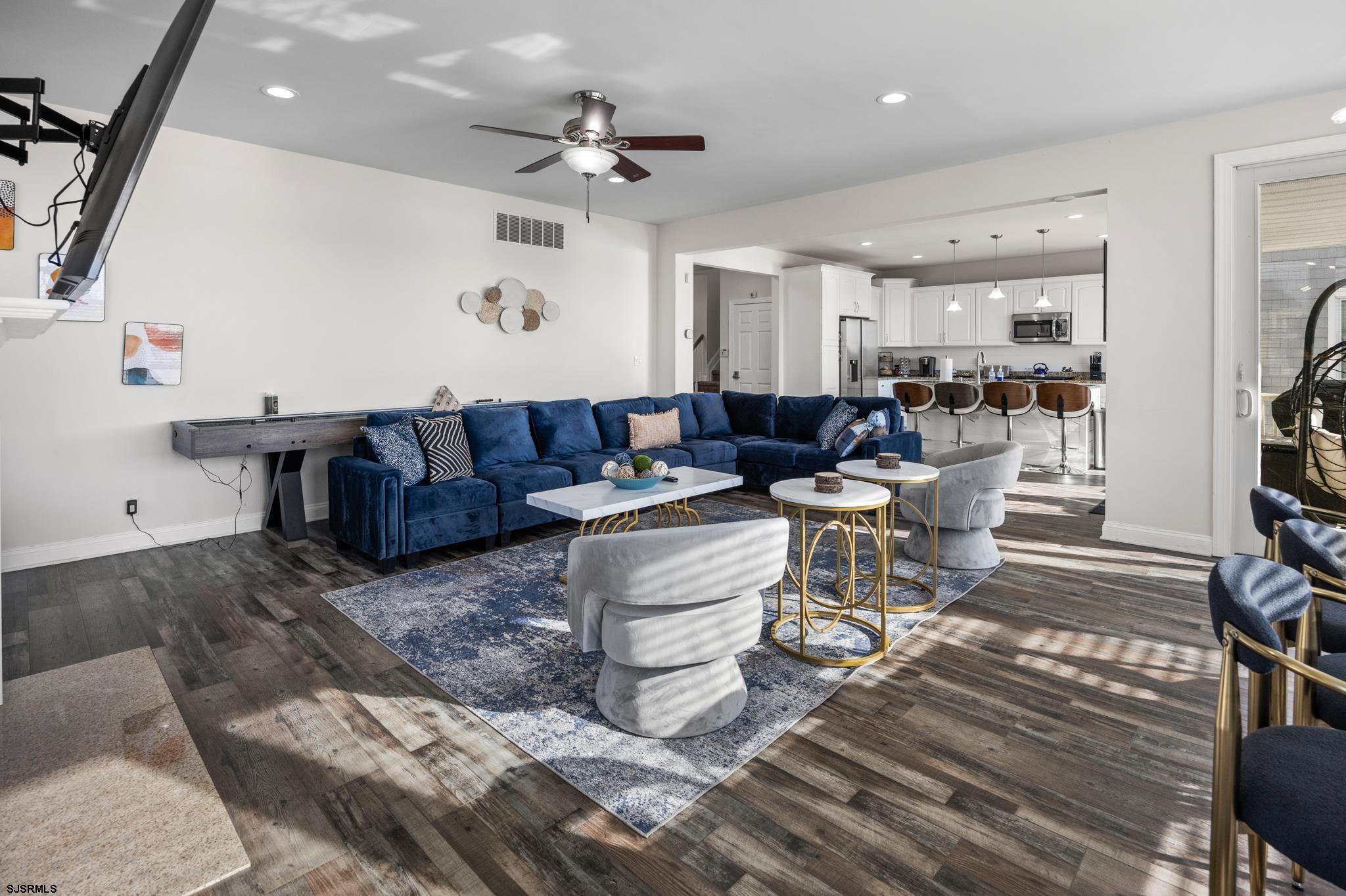 2010 West Riverside Drive Atlantic City, NJ 08401 - Photo 14 of 58 a living room with furniture and a flat screen tv
