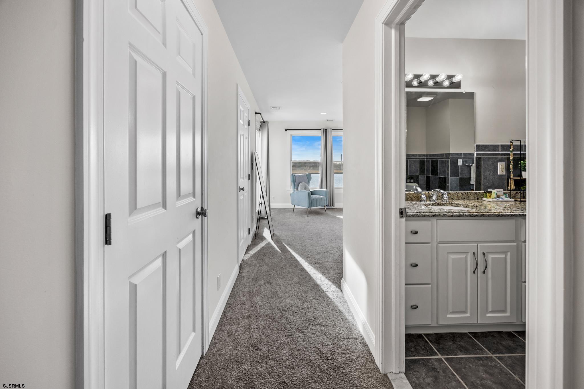 2010 West Riverside Drive Atlantic City, NJ 08401 - Photo 18 of 58 a en suite bathroom with a sink and mirror