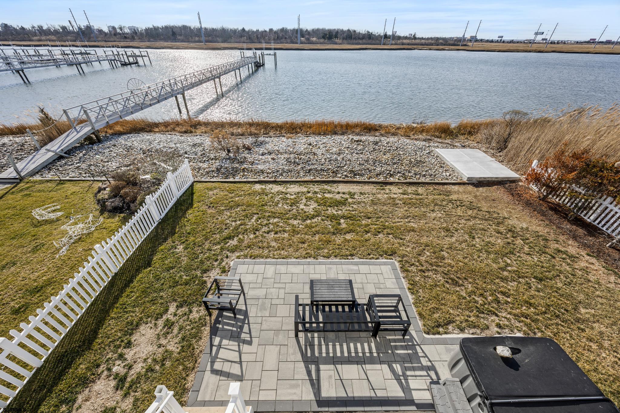 2010 West Riverside Drive Atlantic City, NJ 08401 - Photo 22 of 58 a view of swimming pool with outdoor seating and lake view