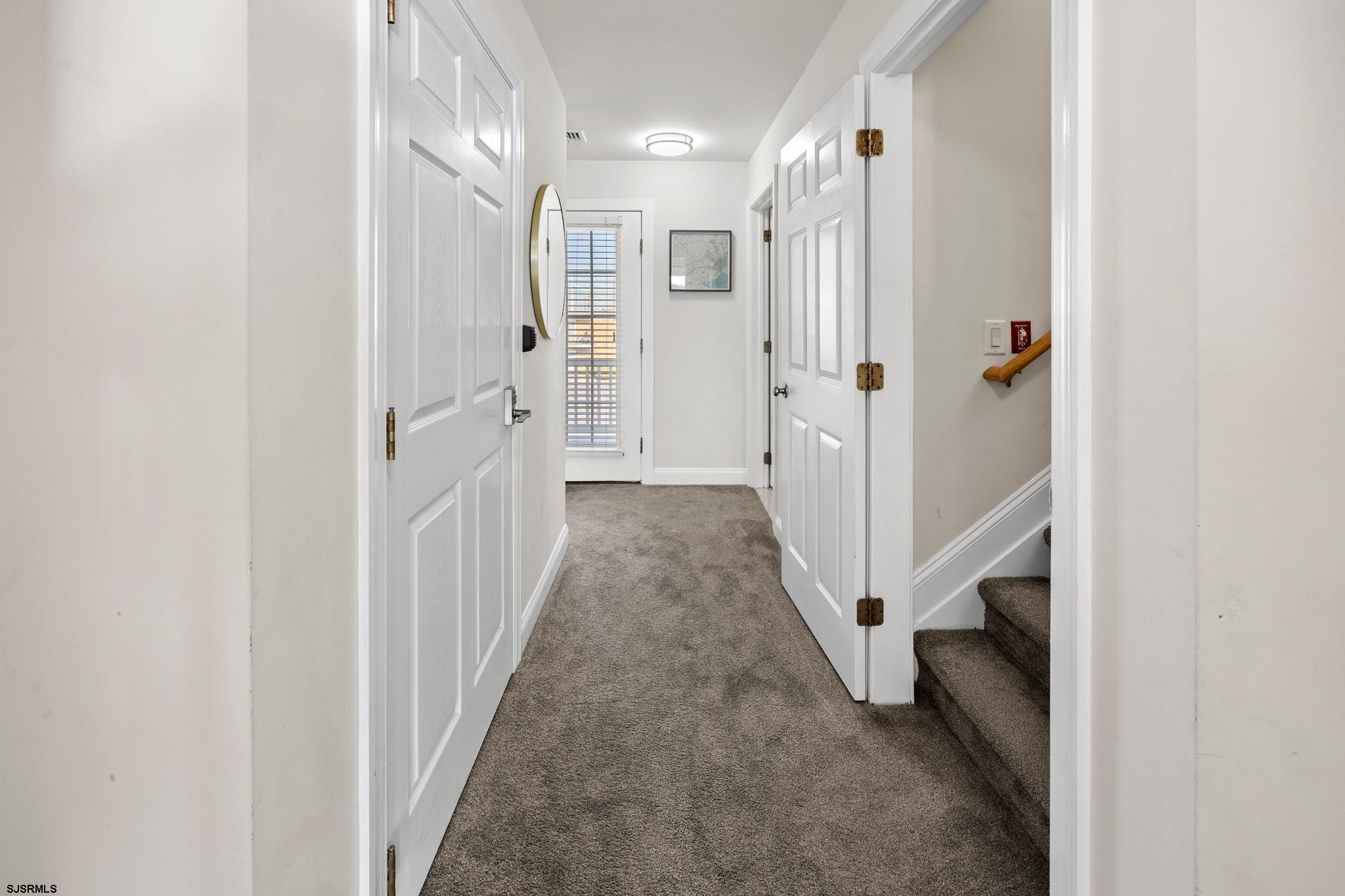 2010 West Riverside Drive Atlantic City, NJ 08401 - Photo 28 of 58 a view of a hallway with white doors