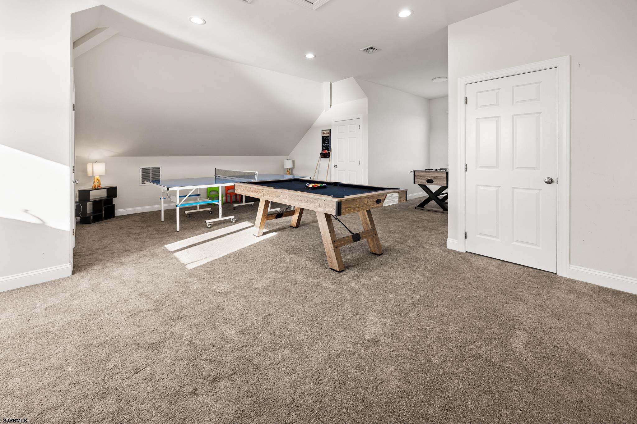 2010 West Riverside Drive Atlantic City, NJ 08401 - Photo 34 of 58 a view of a room with chairs and wooden floor