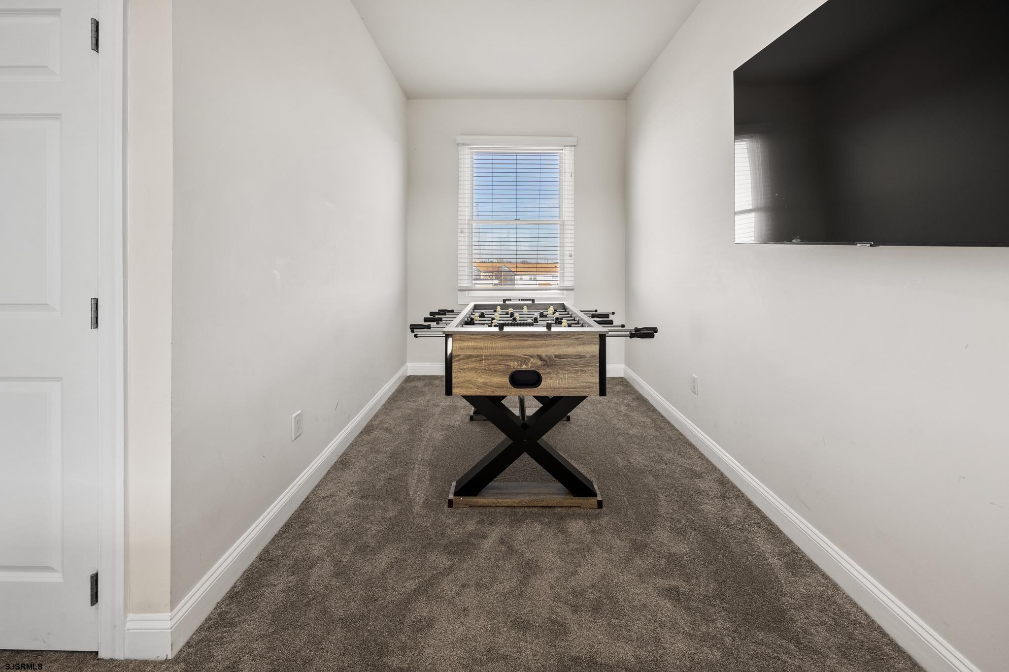 2010 West Riverside Drive Atlantic City, NJ 08401 - Photo 35 of 58 a workspace room with furniture and a window