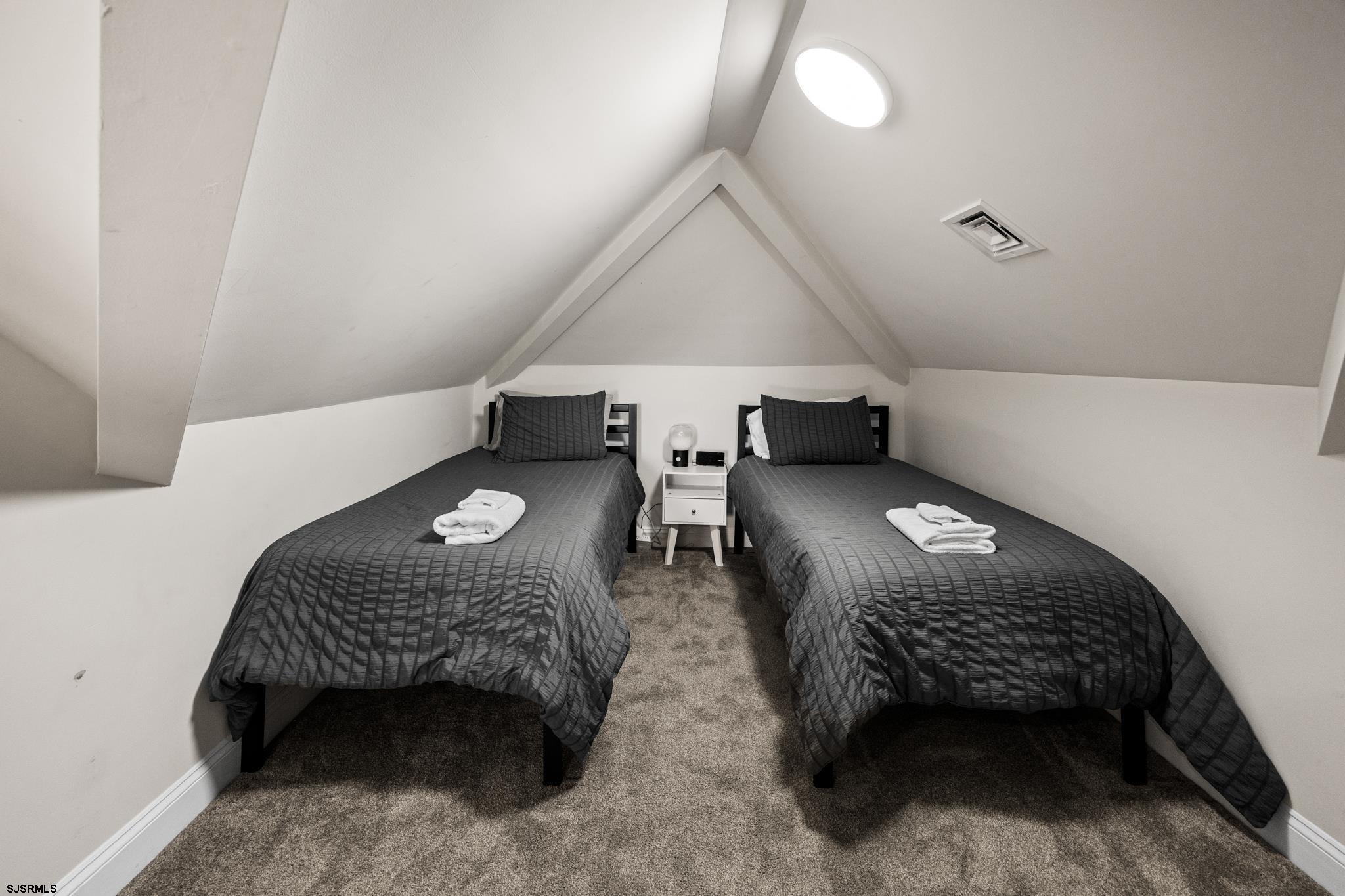 2010 West Riverside Drive Atlantic City, NJ 08401 - Photo 37 of 58 a bedroom with bed and a window