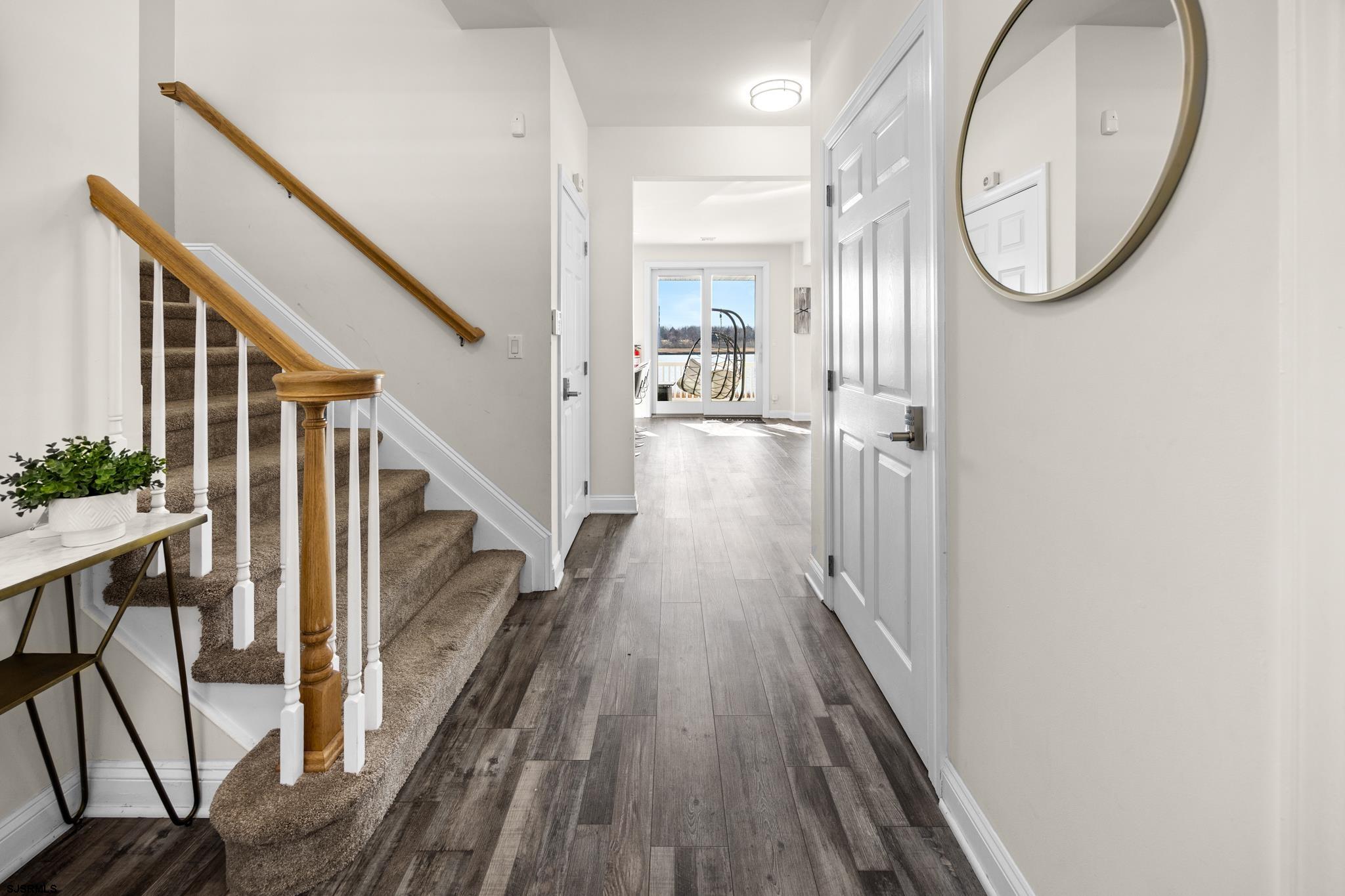 2010 West Riverside Drive Atlantic City, NJ 08401 - Photo 4 of 58 a view of a hallway with wooden floor and entryway