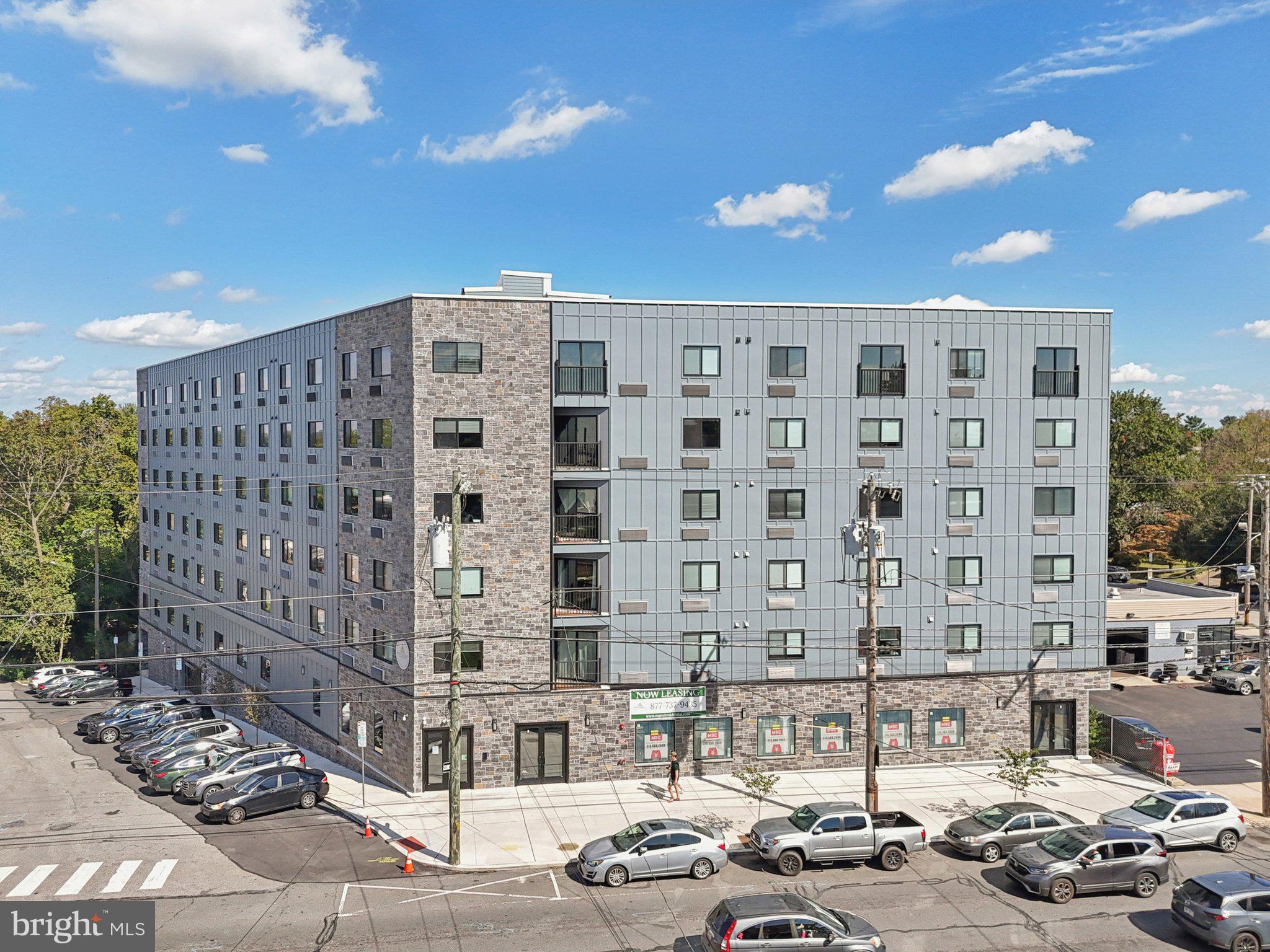 6515 Ridge Avenue, Unit 215 Philadelphia, PA 19128 - Photo 13 of 13 a front view of a building with street view