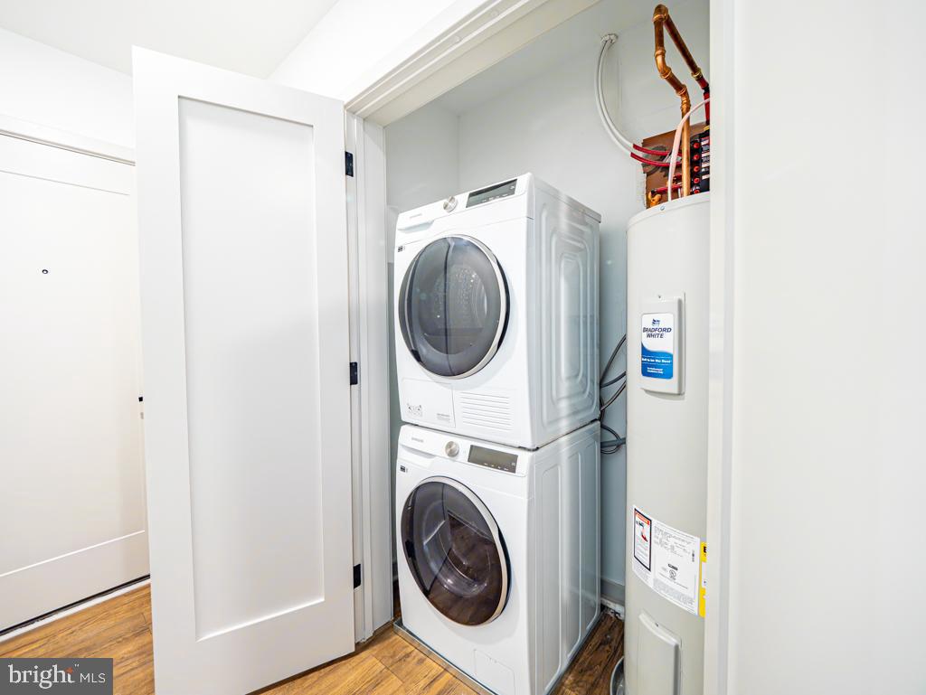 6515 Ridge Avenue, Unit 215 Philadelphia, PA 19128 - Photo 6 of 13 a utility room with dryer and washer