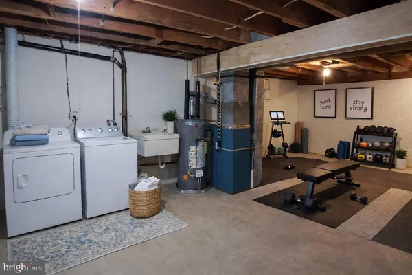 a storage room with washer and dryer