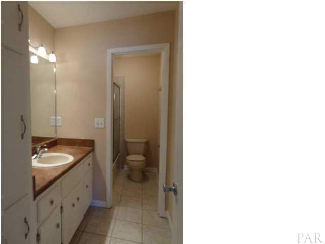 2644 Tinosa Circle Pensacola, FL 32526 - Photo 11 of 19 Separate vanity and dressing area from the shower/tub.