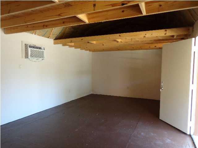 2644 Tinosa Circle Pensacola, FL 32526 - Photo 18 of 19 Workshop storage lofts.