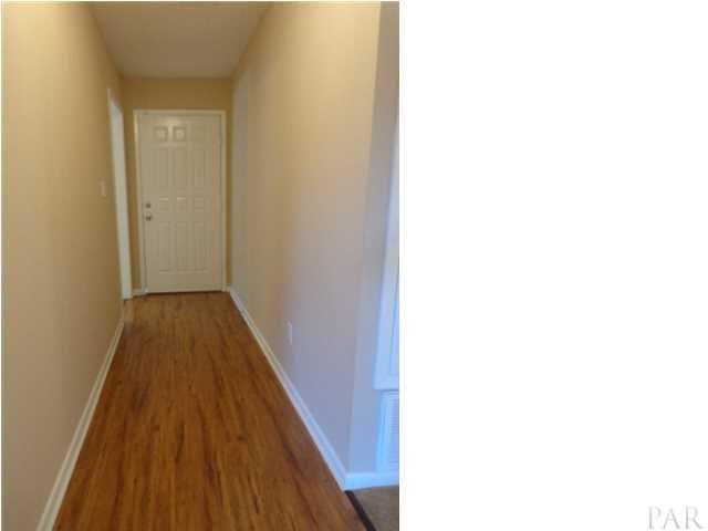2644 Tinosa Circle Pensacola, FL 32526 - Photo 2 of 19 Foyer with new wood laminate flooring.