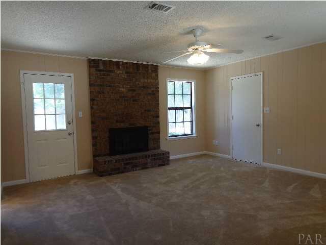 2644 Tinosa Circle Pensacola, FL 32526 - Photo 8 of 19 Family room with fireplace.