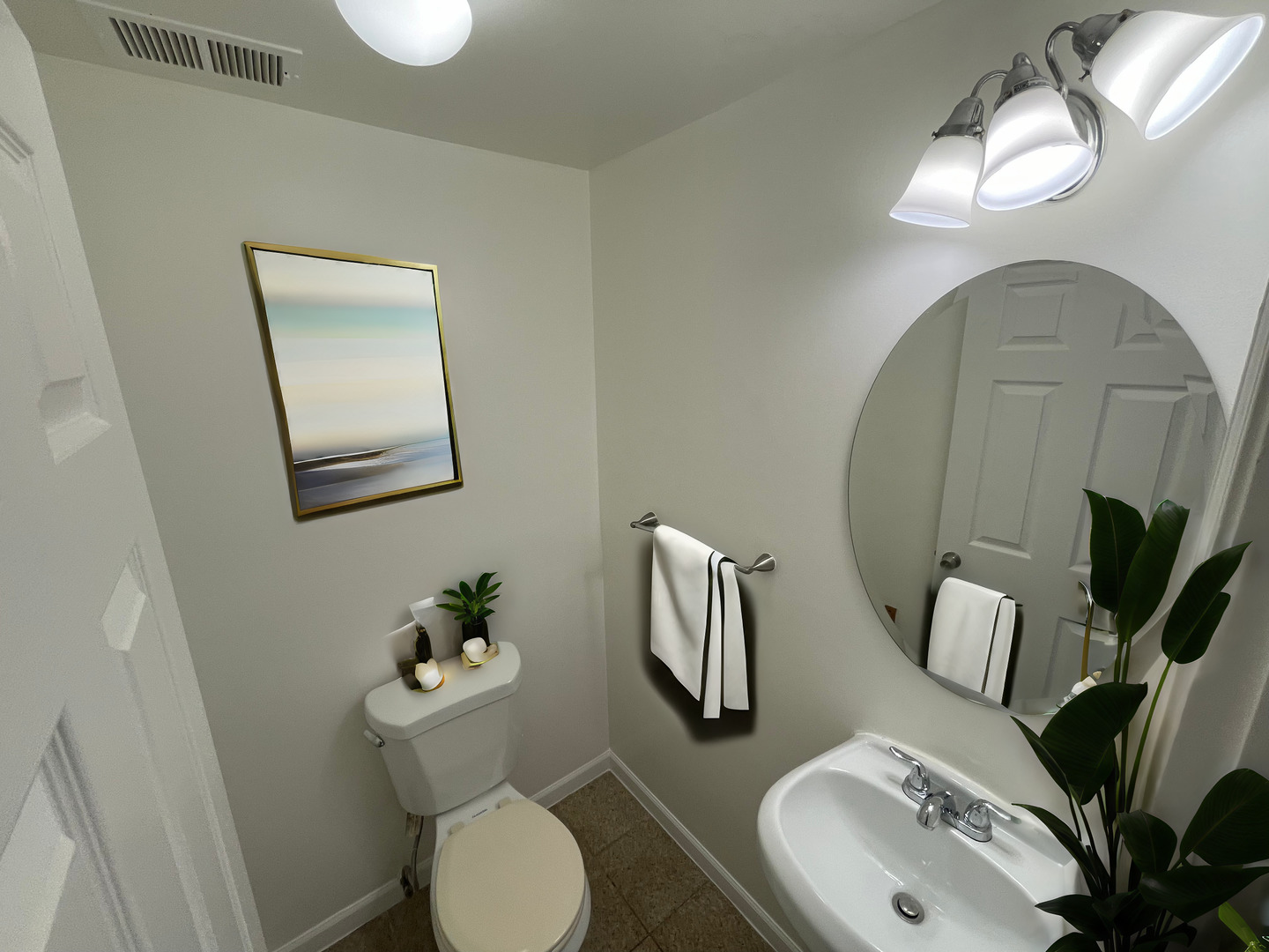 649 East Marquette Road, Unit 4 Chicago, IL 60637 - Photo 12 of 19 a bathroom with a toilet sink and mirror