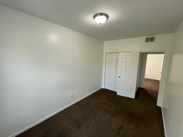 en empty room with windows