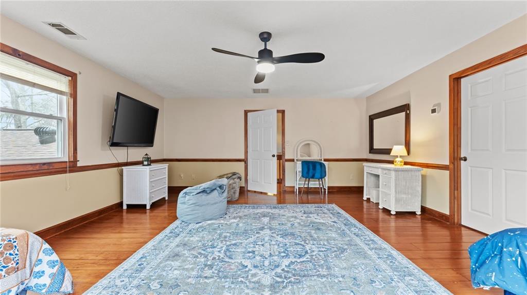 8315 Nicholson Road Cumming, GA 30028 - Photo 31 of 62 a living room with furniture and a flat screen tv