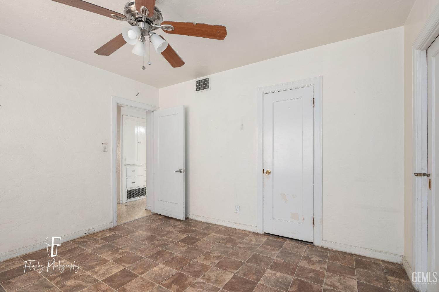 Undisclosed Address Bakersfield, CA 93304 - Photo 30 of 38 a view of a room with a ceiling fan
