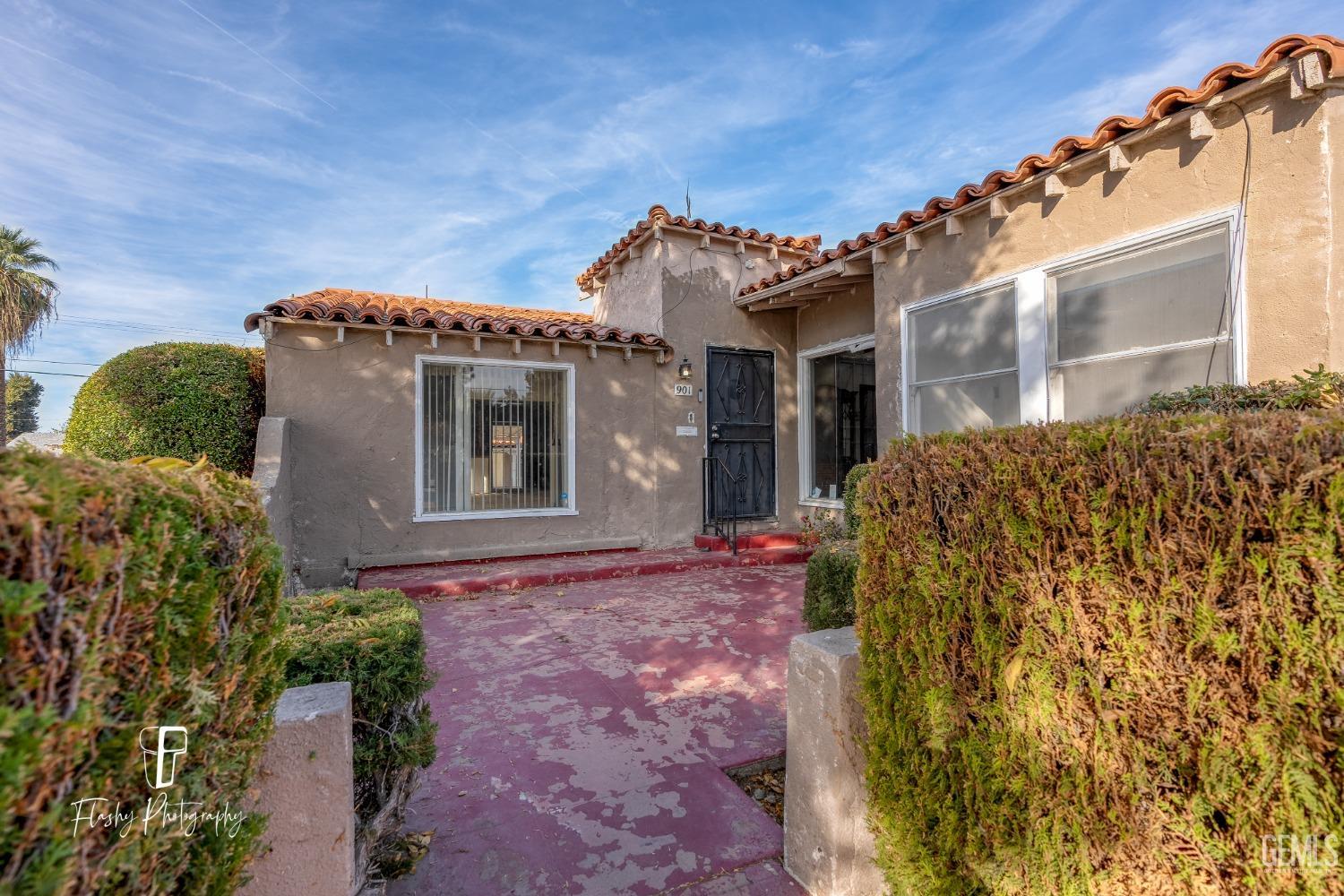 Undisclosed Address Bakersfield, CA 93304 - Photo 3 of 38 a front view of a house