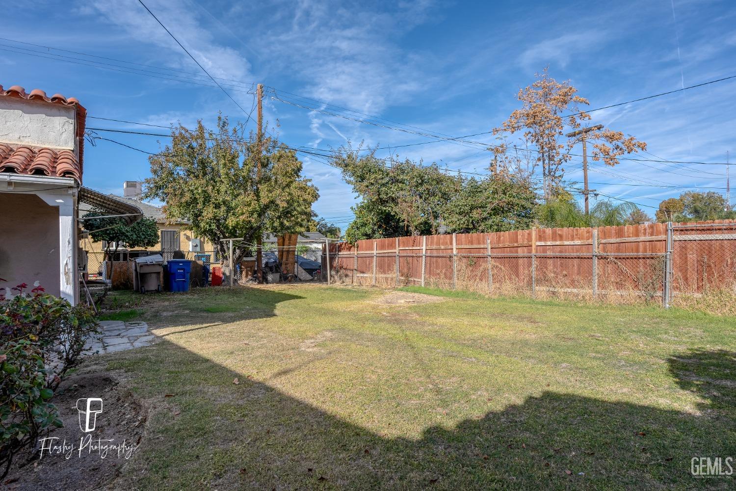 Undisclosed Address Bakersfield, CA 93304 - Photo 36 of 38 a view of a yard in front of a house