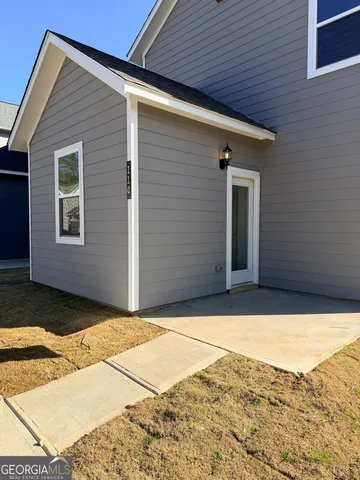 a view of backyard of a house