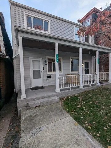 front view of a house with a porch