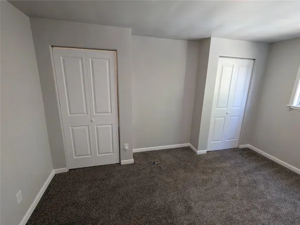 an empty room with a door