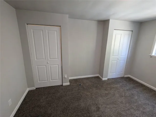 an empty room with a door