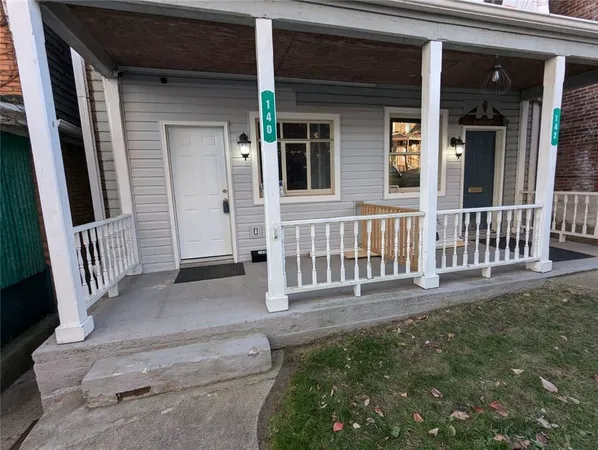 a view of a house with a porch