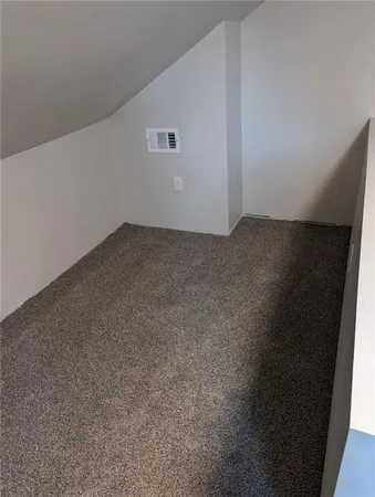 an empty room with a workbench