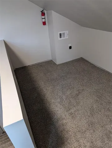 a front view of a house with stairs