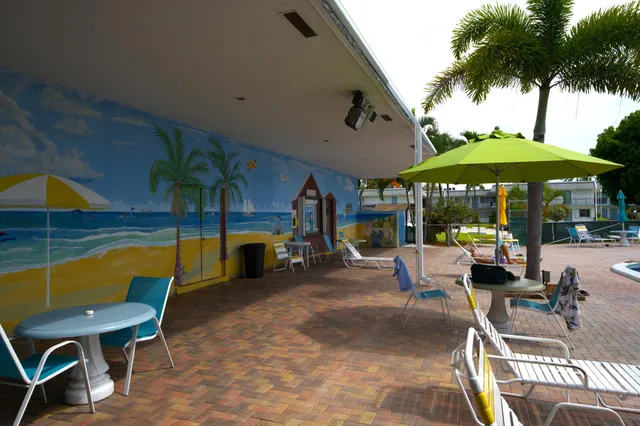 a view of a swimming pool with a patio