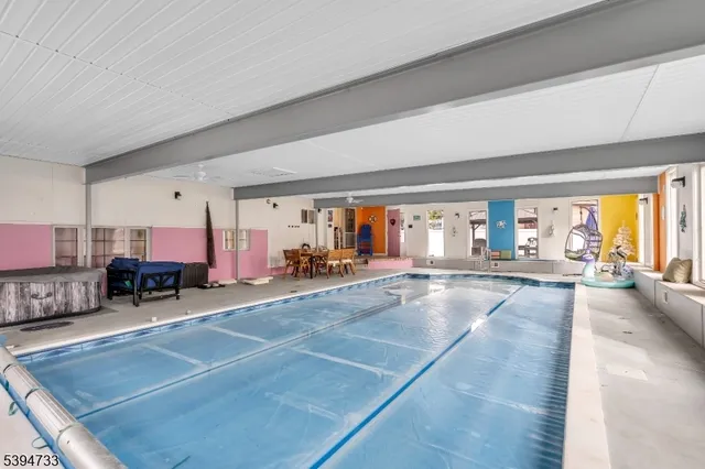 a room with lots of table and chairs