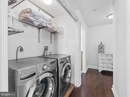 a view of a storage & utility room with washer and dryer