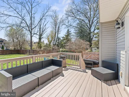 a view of roof deck with patio