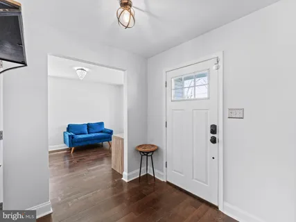 a view of a livingroom with furniture and windows
