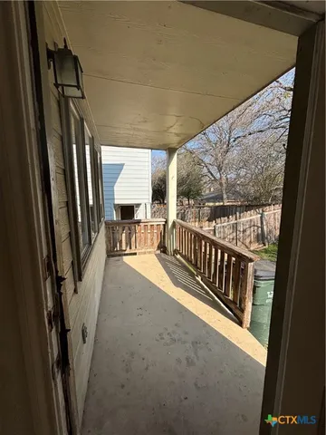 a view of hallway with stairs