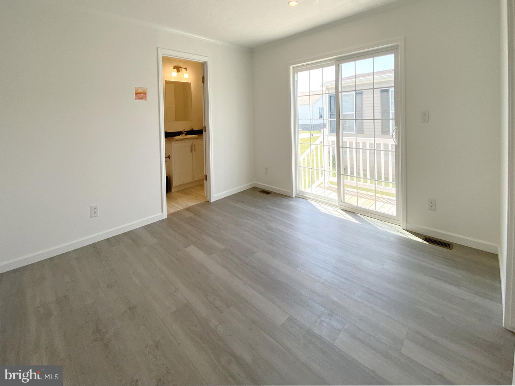 12 Carlisle Way Lewes, DE 19958 - Photo 11 of 25 Bright and airy open space awaits.