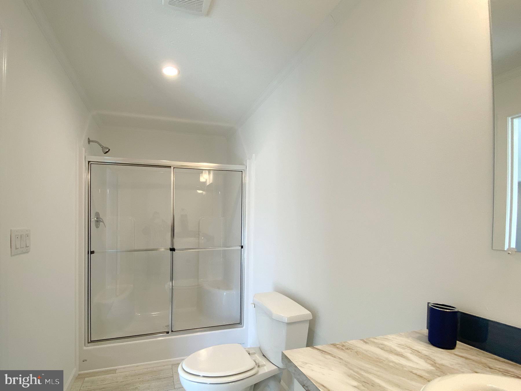 12 Carlisle Way Lewes, DE 19958 - Photo 14 of 25 Modern bathroom with sleek finishes.