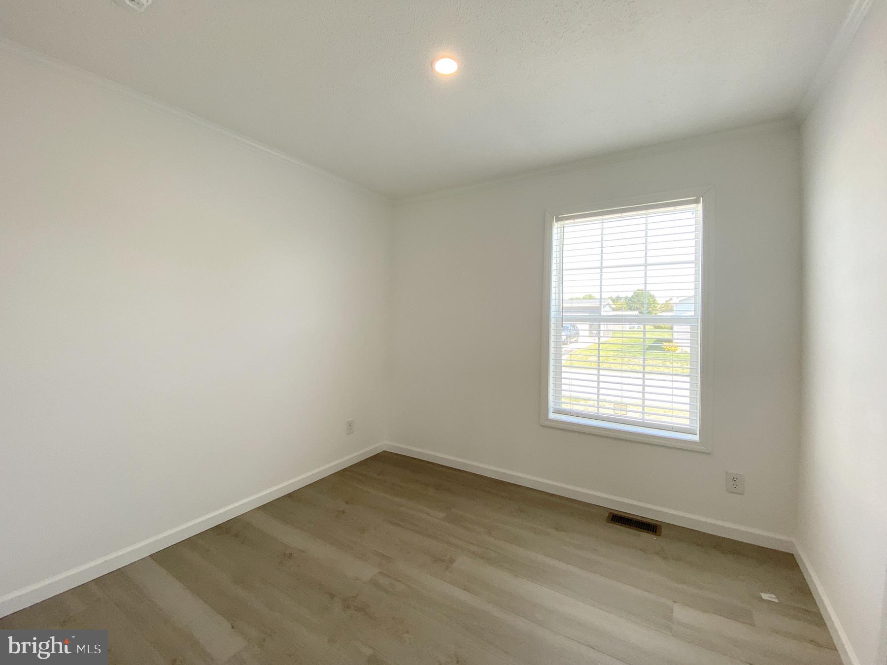 12 Carlisle Way Lewes, DE 19958 - Photo 17 of 25 Bright and airy blank canvas room.
