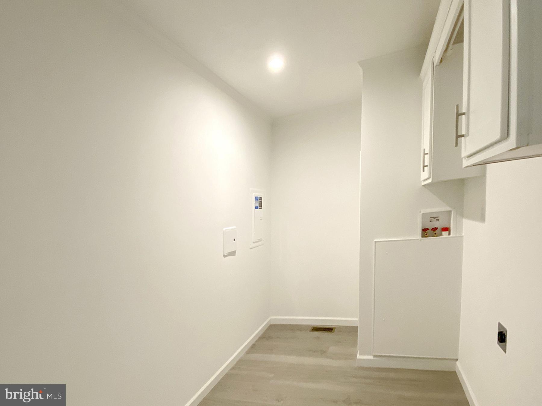 12 Carlisle Way Lewes, DE 19958 - Photo 21 of 25 Bright and airy utility space.