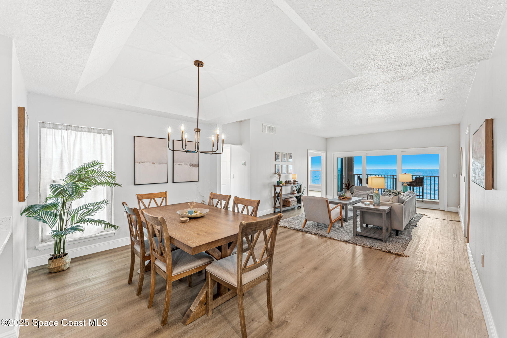 3037 S Highway, Unit 3C Melbourne Beach, FL 32951 - Photo 12 of 52 a view of a dining room with furniture window and outside view